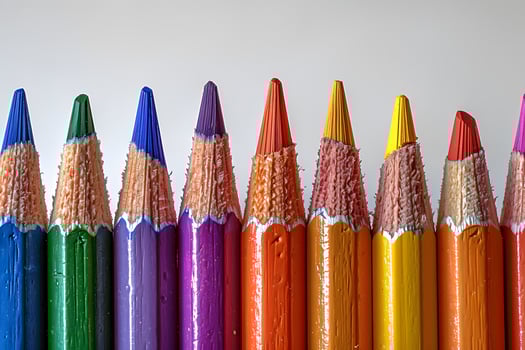 Colorful Palette of Sharpened Pencils in a Row for Art and Education Projects photo