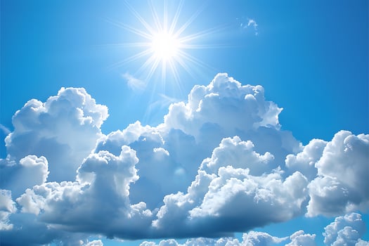 Bright Sunny Sky with Fluffy Clouds - Ideal for Summer Designs and Nature Posters photo