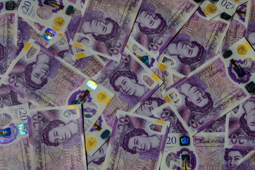 Pile of Twenty Pound Notes photo