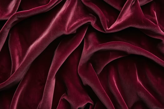 Close-up of Red Velvet Fabric with Soft Drapes photo