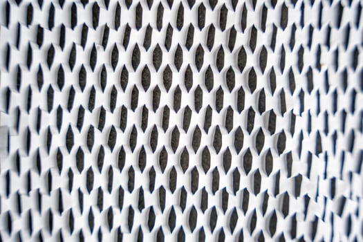 Texture of corrugated white paper for safe transportation, in which the goods brought by the courier delivery service are wrapped, environmental packaging concept. Ecological background. photo