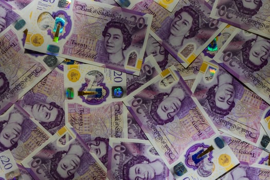Pile of Twenty Pound Notes photo