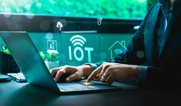 Business Professional Working on Laptop to Manage Internet of Things IoT Network with AI, Cloud, and Smart Home Integration Icons Highlighting Advanced Digital Connectivity and Automation photo