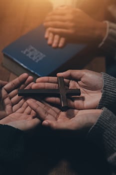 Christian group are praying to god with the bible and sharing the gospel. Concept of faith for god. photo