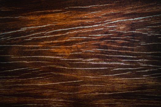 Dark wood texture background surface with old natural pattern. Walnut wood texture. Close up walnut planks texture background. photo