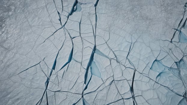 top view of cracks in lake ice with texture as background. photo