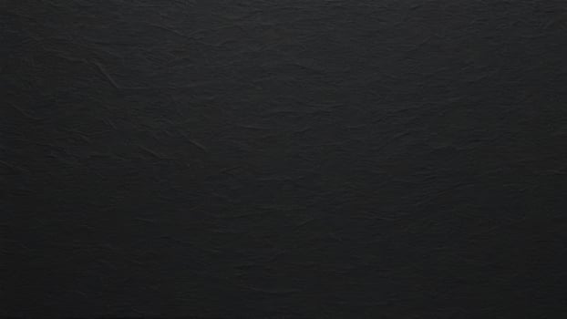 black paper with texture as background photo