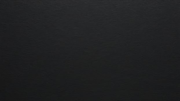 black paper with texture as background photo
