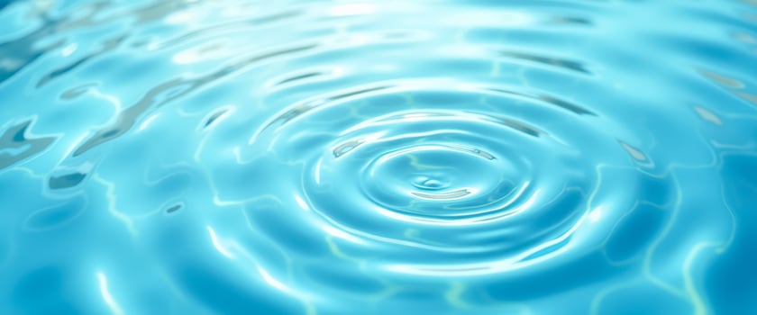 Abstract blue water ripples background photo