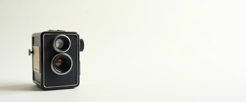 Vintage camera on white background photo