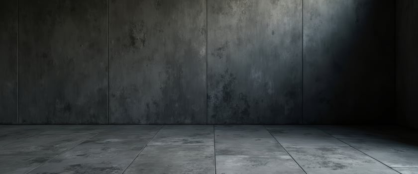 Empty Industrial Room with Concrete Floor and Walls photo
