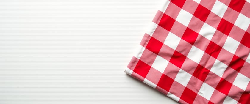 Red and White Checkered Tablecloth on a White Striped Surface photo