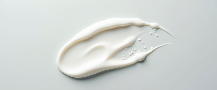 White Cream Swirl on Grey Background photo