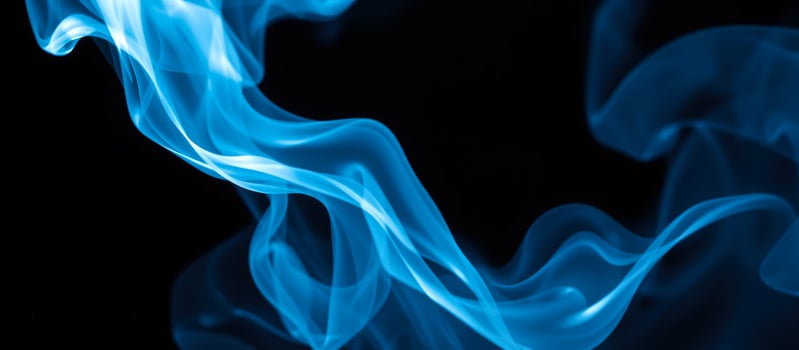 Abstract Blue Smoke on Black Background photo