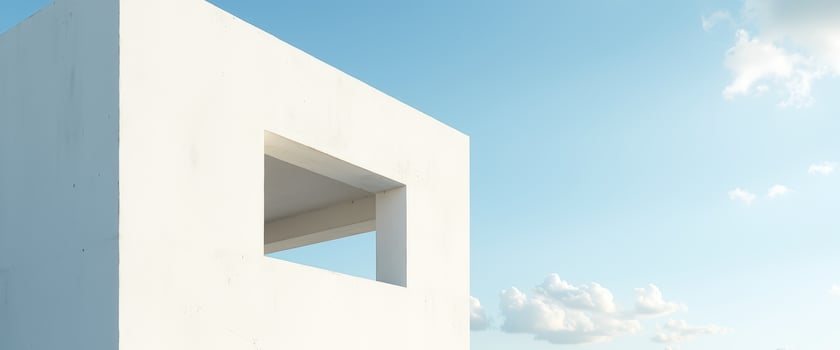 Minimalist White Wall with Window and Blue Sky photo