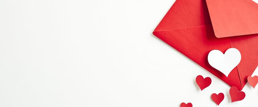 Red Envelope with White Heart and Scattered Red Hearts photo