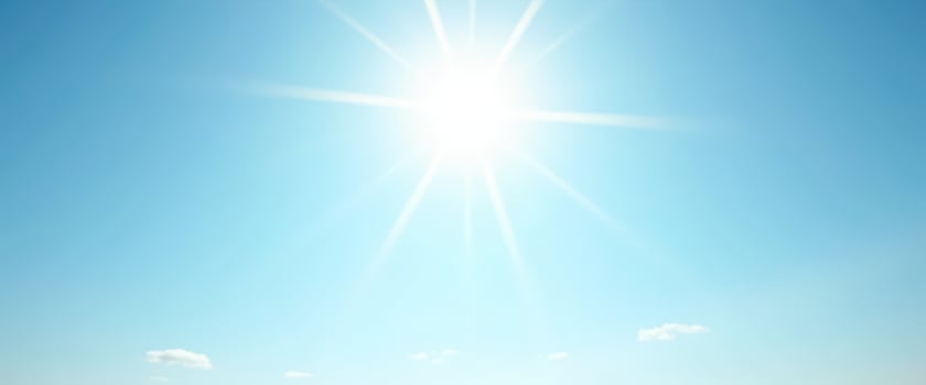 Blue Sky with Shining Sun and Lens Flare photo
