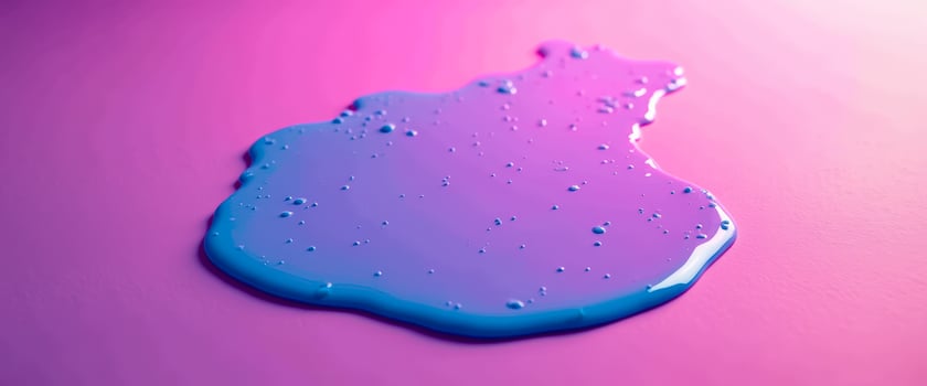 Abstract Blue and Pink Paint Splotch on Pink Background photo