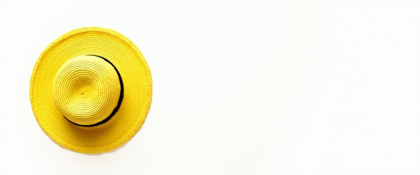 Yellow Straw Hat on White Background photo