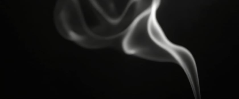 Abstract Smoke Swirls on Black Background photo