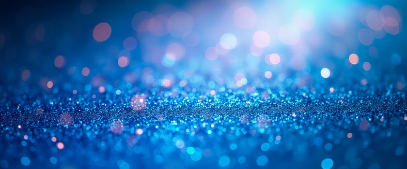 Abstract Blue Glitter Background with Bokeh Lights photo