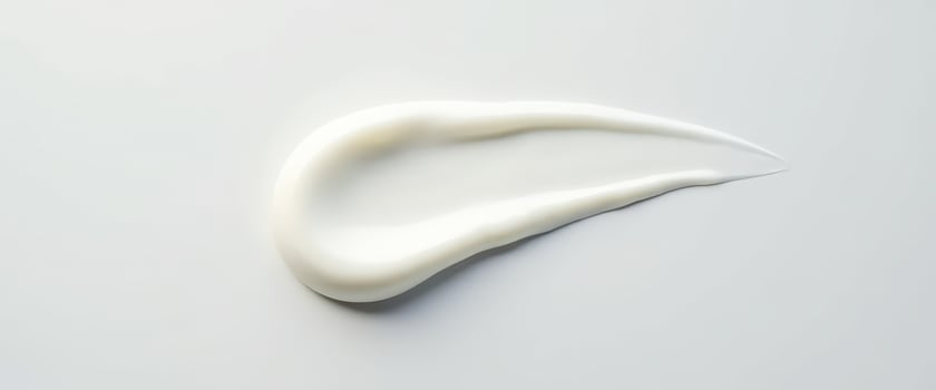 White Cream Swirl on White Background photo