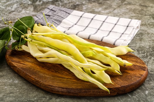 Raw green bean strings heap photo