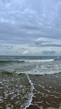 Waves rolling on the Baltic Sea coast. Seascape. Latvia photo