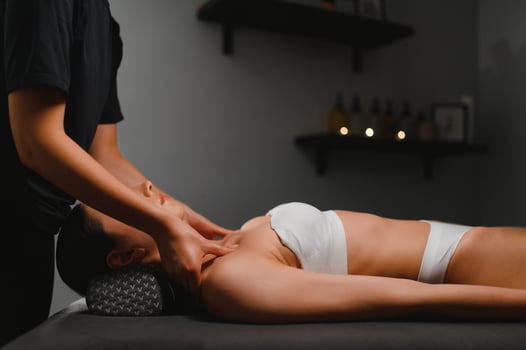 Beautiful woman having relaxing in spa massage salon photo