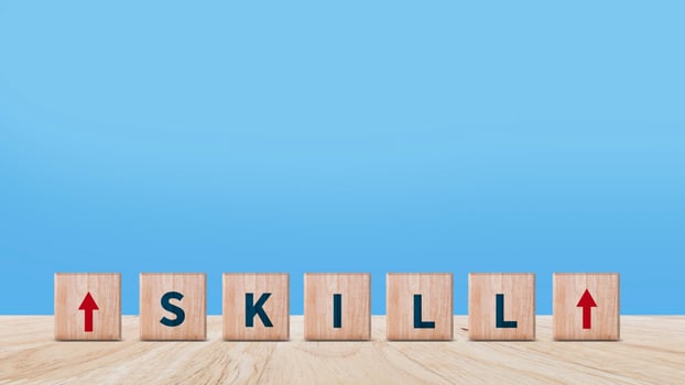 Skill training, Personal development and promoted employee, education, learning, ability, Upskilling and personal development concept, Upskilling, reskilling, new skills on wooden cube. photo