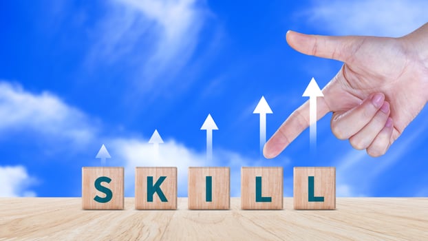Skill training, Personal development and promoted employee, education, learning, ability, Upskilling and personal development concept, Upskilling, reskilling, new skills on wooden cube. photo