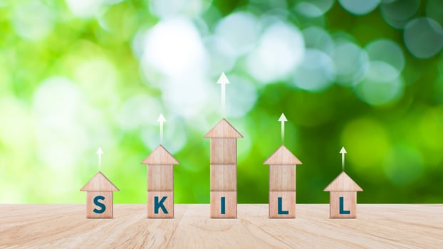 Skill training, Personal development and promoted employee, education, learning, ability, Upskilling and personal development concept, Upskilling, reskilling, new skills on wooden cube. photo