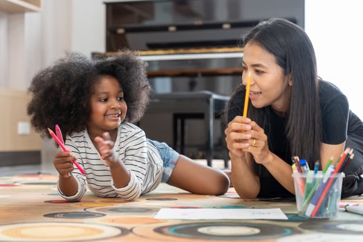 Happy black children playing learning paint on paper. Activity, development, IQ, EQ, meditation, brain, muscles, essential skills, family having fun spending time together. Holiday photo