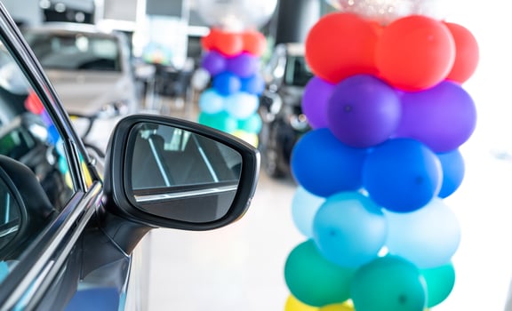 Car parked in luxury showroom. Car dealership office. Car showroom business. New car parked in modern showroom. Auto for sale and rent business. Automobile leasing and insurance. Electric automobile. photo