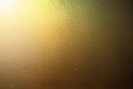 Elegant Golden Wall Texture with Metallic Accents for Stylish Designs and Banners photo