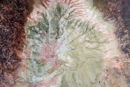 Aerial Perspective of Arid Alluvial Lake Surrounded by Mountains photo