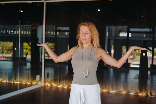 The girl does yoga and is in a state of meditation. The concept of a healthy lifestyle photo