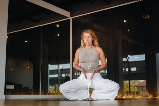 The girl does yoga and is in a state of meditation. The concept of a healthy lifestyle photo