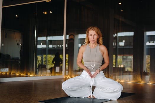The girl does yoga and is in a state of meditation. The concept of a healthy lifestyle photo