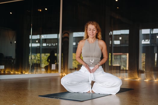 The girl does yoga and is in a state of meditation. The concept of a healthy lifestyle photo