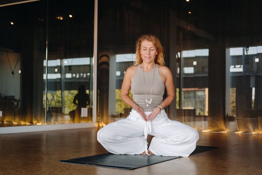 The girl does yoga and is in a state of meditation. The concept of a healthy lifestyle photo