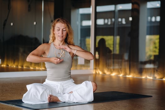 The girl does yoga and is in a state of meditation. The concept of a healthy lifestyle photo