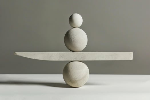 Balancing stones balancing on a seesaw representing harmony and balance photo
