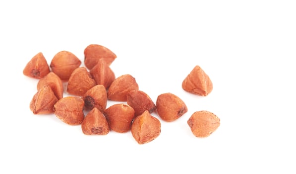 Raw buckwheat on white photo