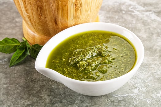 Homemade vegetarian basil pesto sauce photo