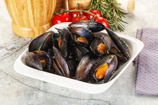 Tasty mussels in the bowl photo