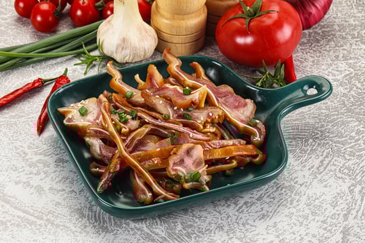 Sliced smoked pork ear snack photo