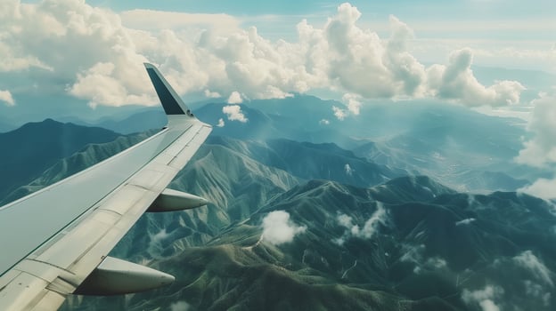 Landscape view blue sky, mountain and clouds from window plane travel journey photo