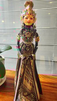 Wayang golek is a three-dimensional performing art made from wood that is carved to resemble humans, then dressed up with cloth as clothing to make it more attractive. photo