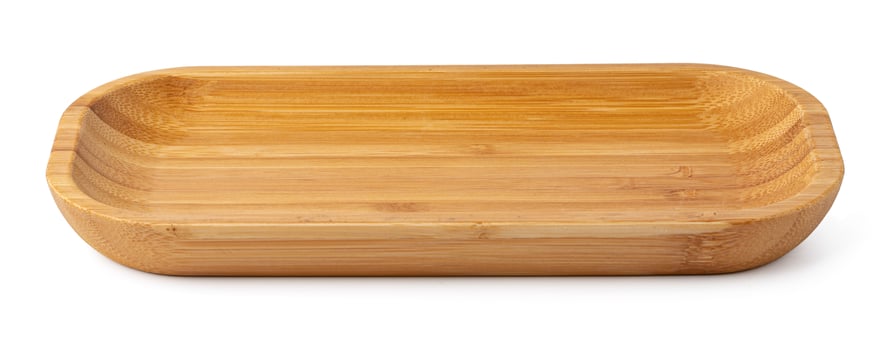 Wooden plate isolated on white background, close up photo